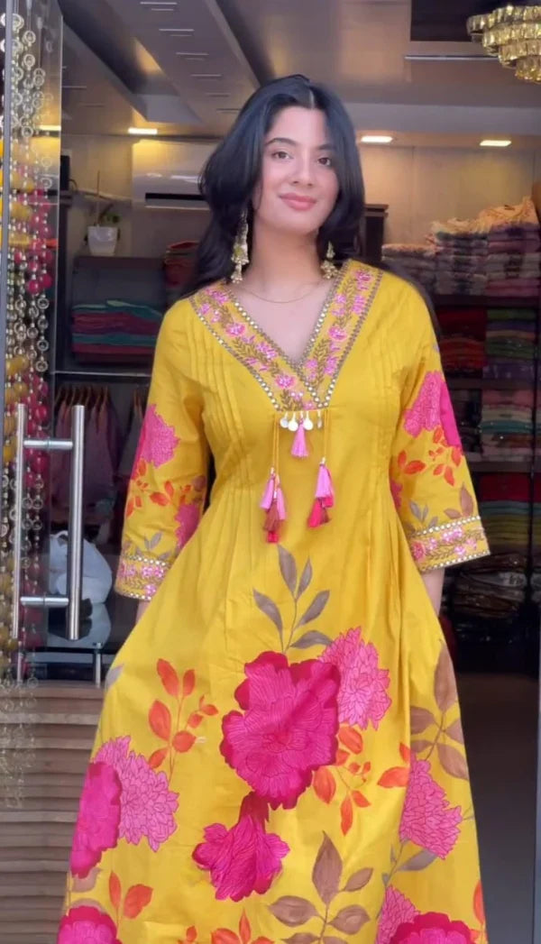 Women’s Yellow Cotton Floral Printed Anarkali Kurta with Tassel Detailing